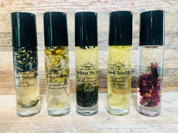 Herb infused essential oil roll-on